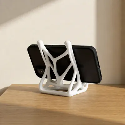 Support de Telephone Blanc - Repose Smartphone Bionique Squelettique - Impression 3D — objet imprimé en 3D par PureFlow
